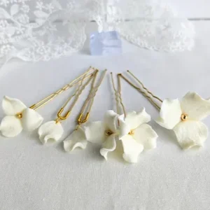 Parure bijou et accessoires cheveux mariage luxe blanc et or