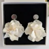 Boucles d'oreilles mariage fleur argent