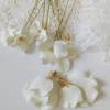 Bijoux et accessoires de mariage porcelaine froide et or. Blanc ivoire by Marguerite