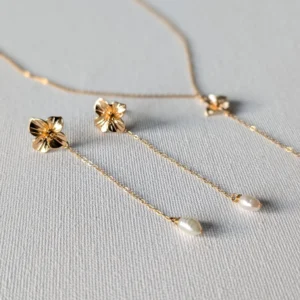 Parure mariage luxe - Boucles d'oreille et collier perle et fleur dorée