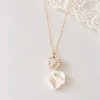 Collier de mariée STELLA : pendentif serti de zircones et deux pétales de porcelaine froide blanche sur chaîne gold filled, by Marguerite